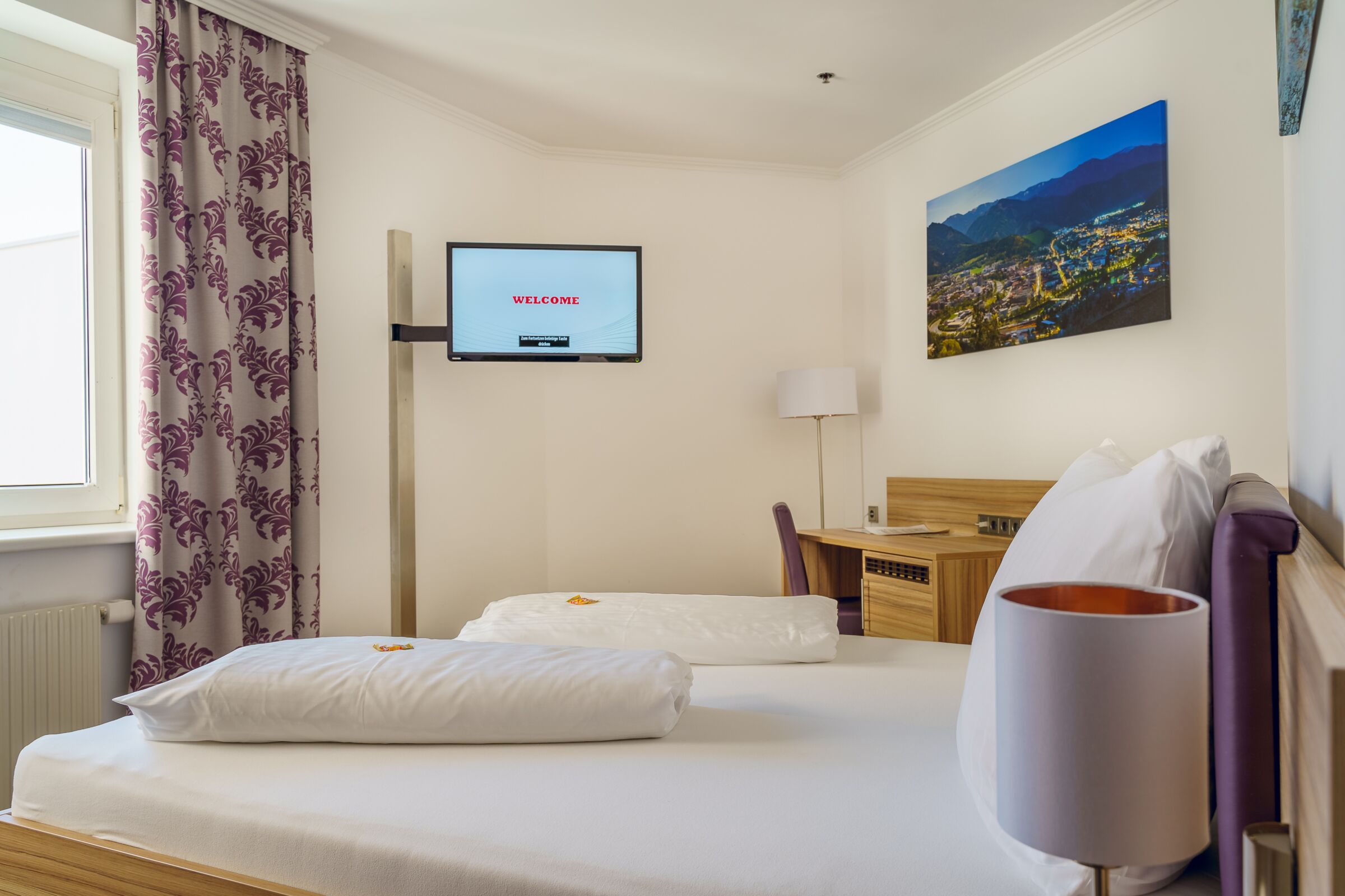 Fernseher an de Wand montiert