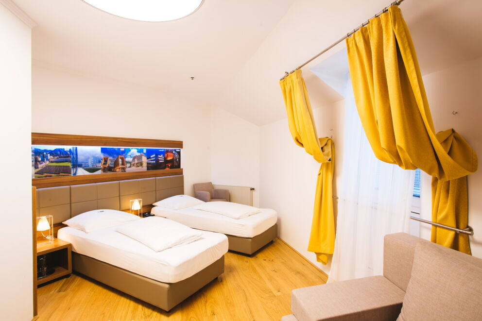 zwei Twin sized Betten im Business Zimmer