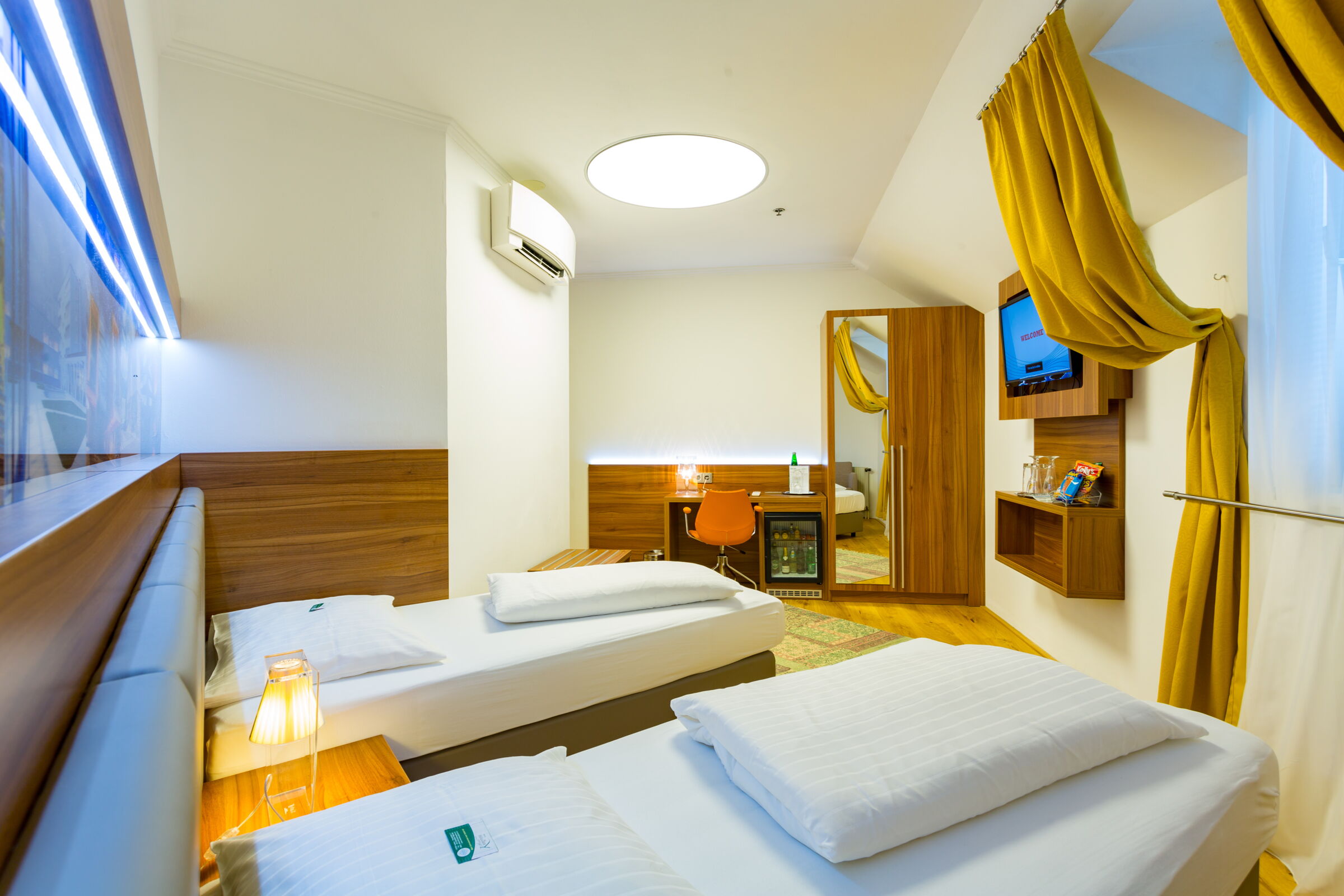 zwei Twin sized Betten im Business Zimmer